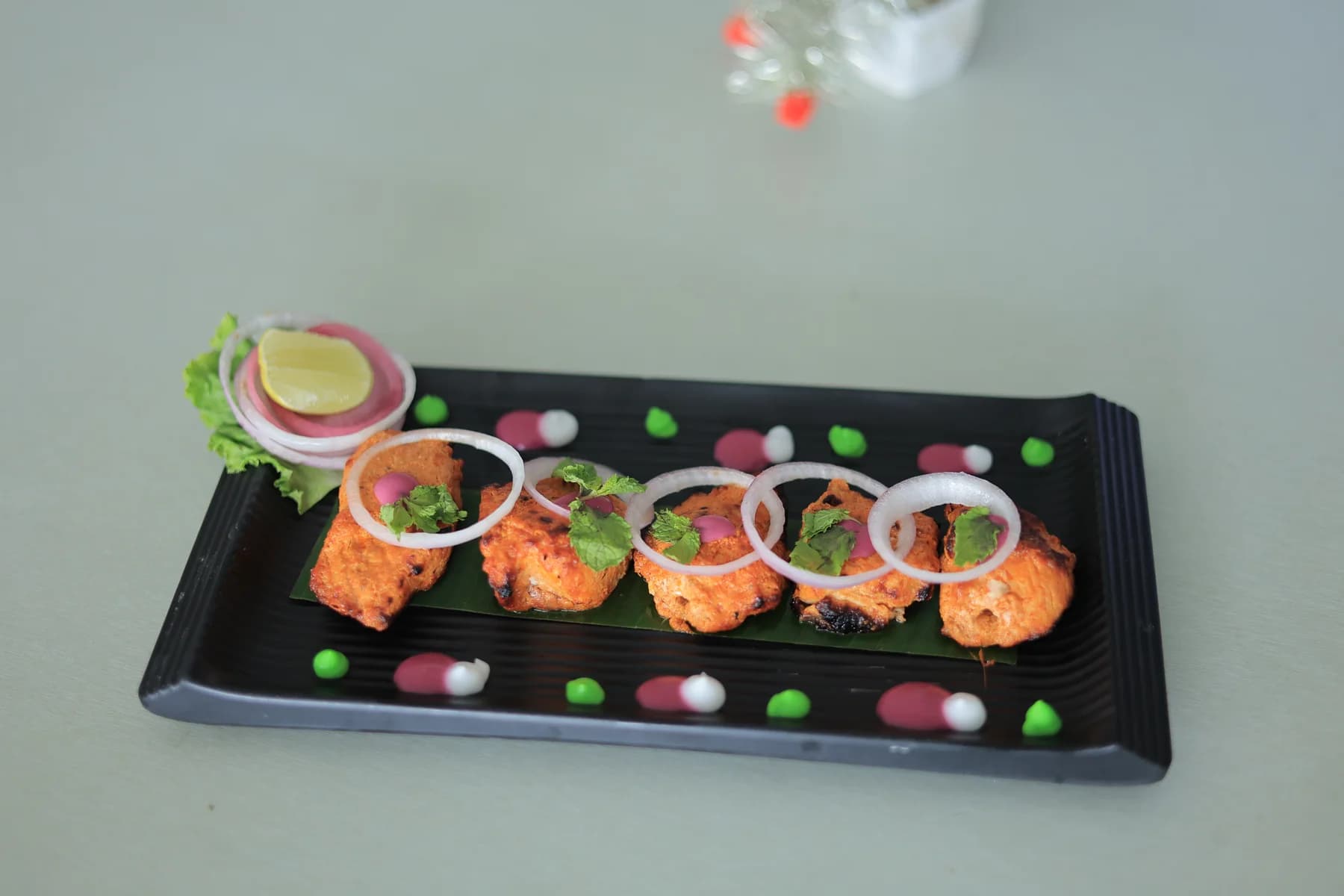 Fish Tikka Ajwaini served at Dolphin Fun & Food